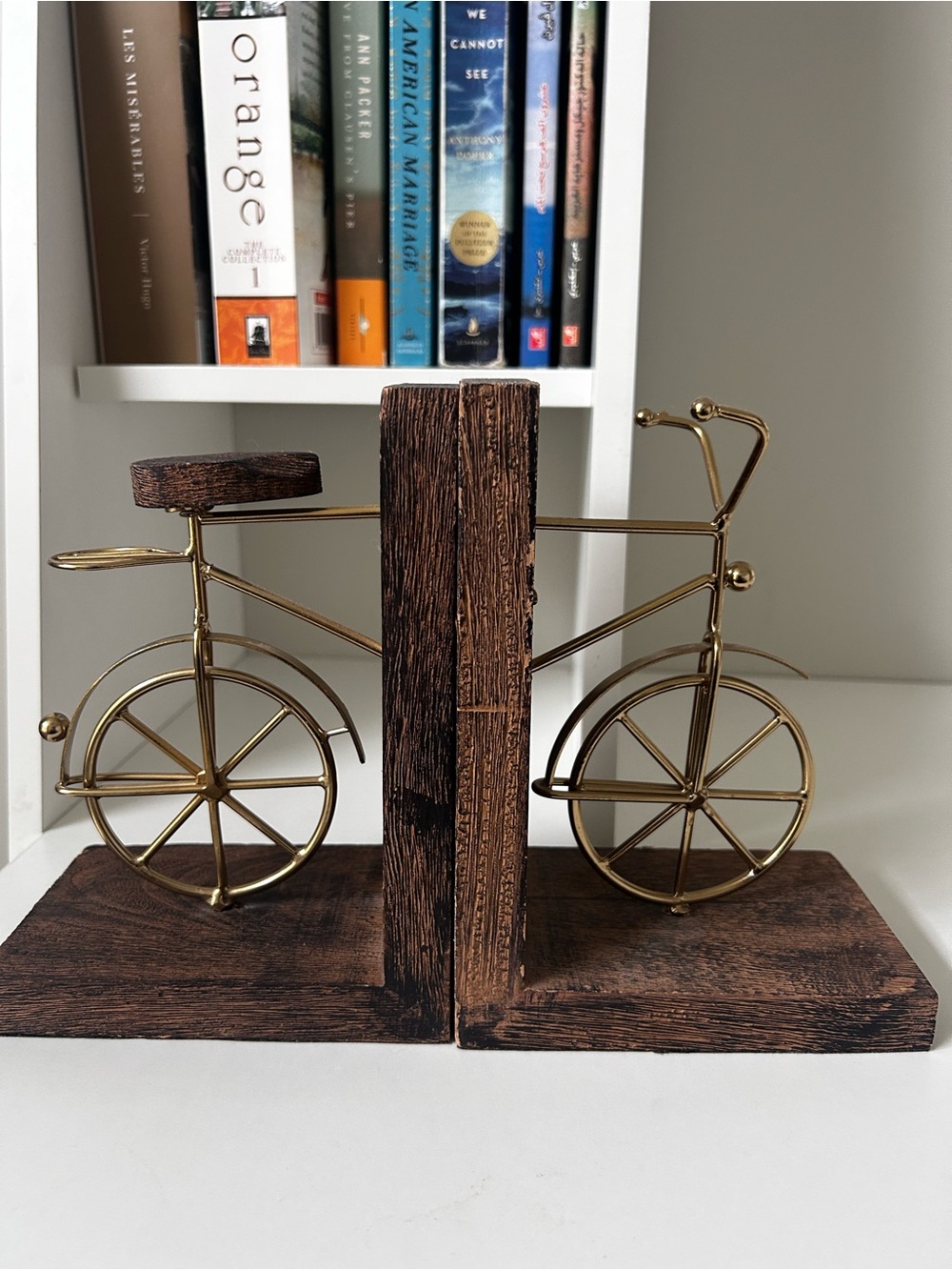 Decorative Gold Bicycle Bookends with Dark Wood Base